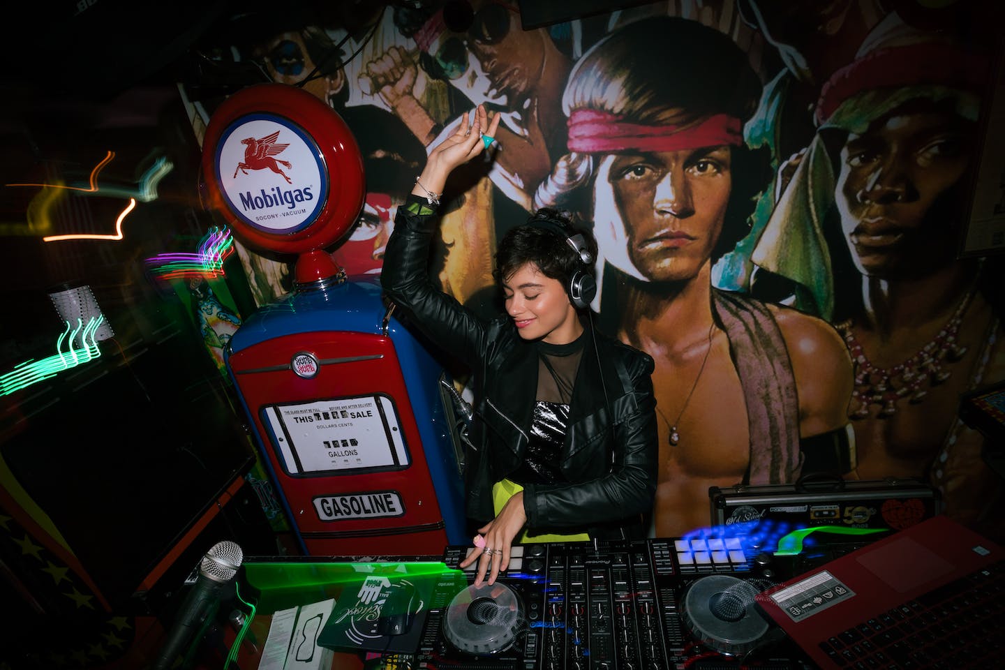 An artist using a laptop to distribute music, symbolizing the evolution to digital platforms.